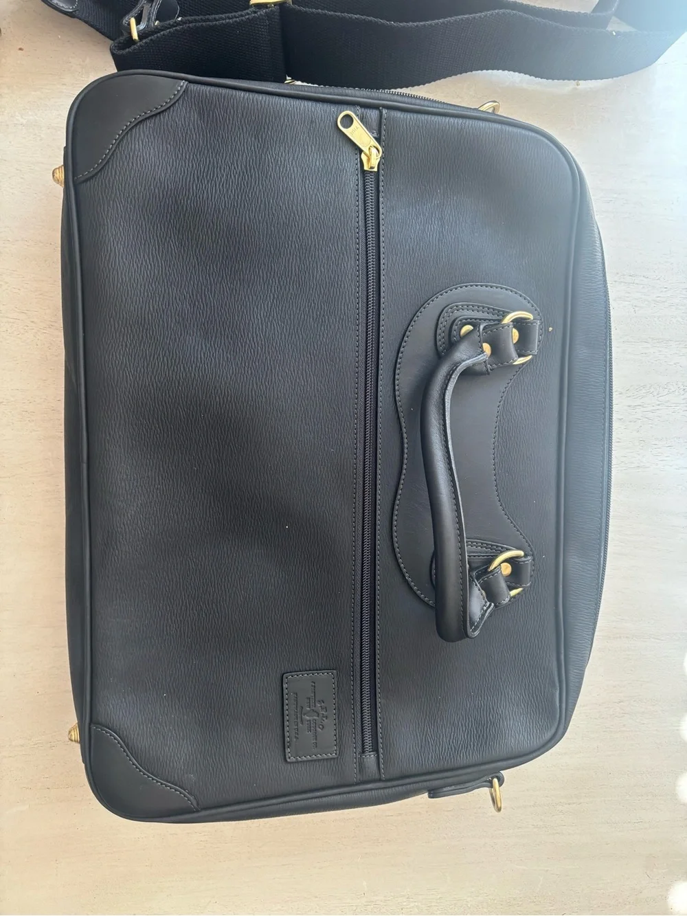 Courier Ruc Case in black grain leather